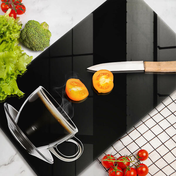 Üveg vágódeszka Egy pohár forró kávé