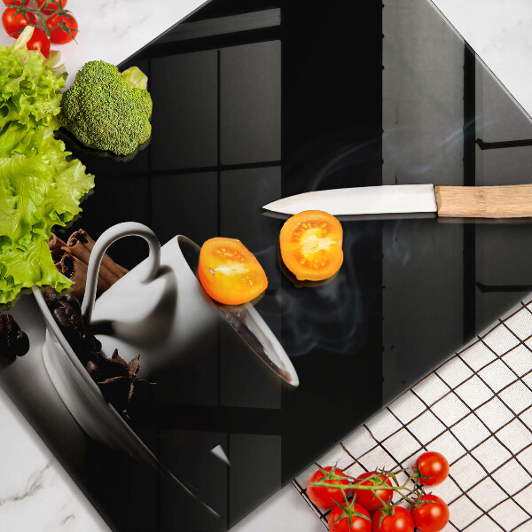 Üveg vágódeszka Egy csésze forró kávé