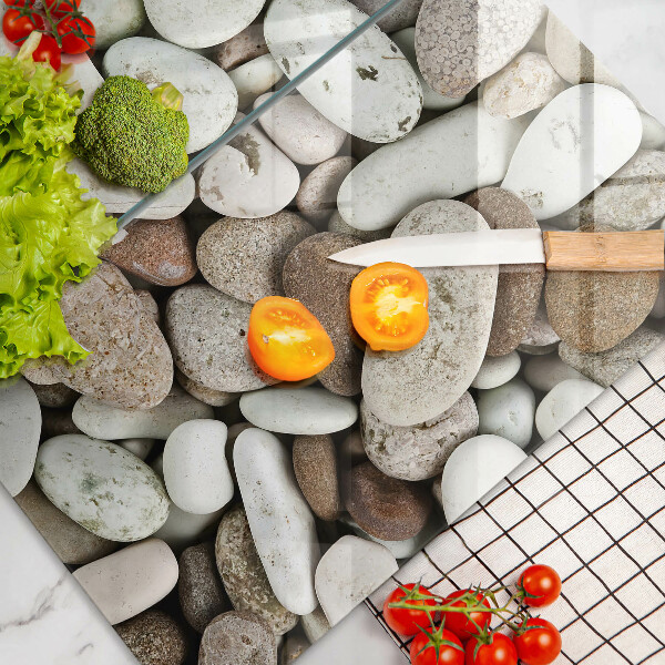 Üveg vágódeszka Kis kövek háttér