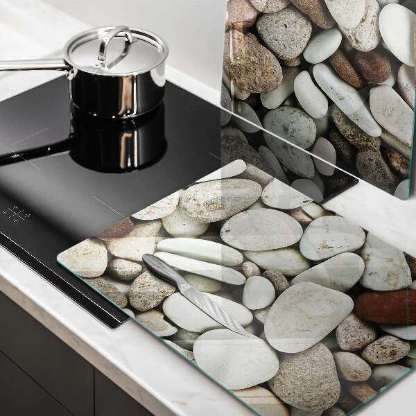 Üveg vágódeszka Kis kövek háttér