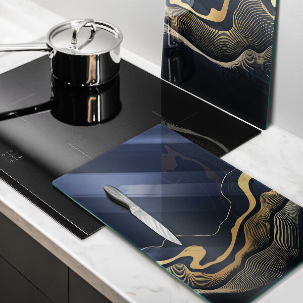 Üveg vágódeszka Absztrakt arany vonalak