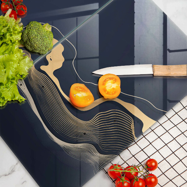 Üveg vágódeszka Absztrakt arany vonalak