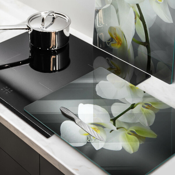 Üveg vágódeszka Fehér orchidea virágok