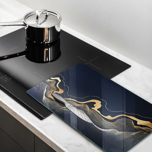 Üveg vágódeszka Absztrakt arany vonalak