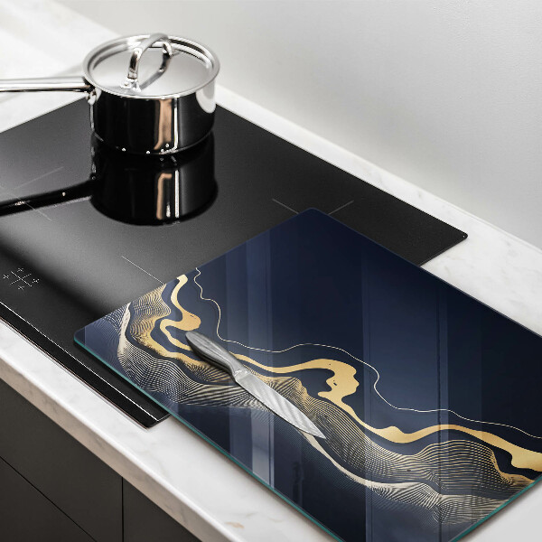 Üveg vágódeszka Absztrakt arany vonalak