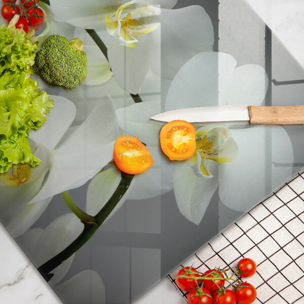 Üveg vágódeszka Fehér orchidea virágok