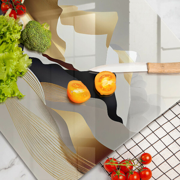 Üveg vágódeszka Absztrakt arany hegyek