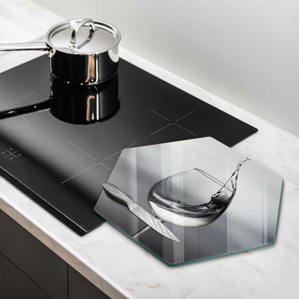 Üveg vágódeszka Egy pohár vizet