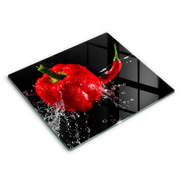 Tűzhelyvédő üveglap Piros paprika vízben