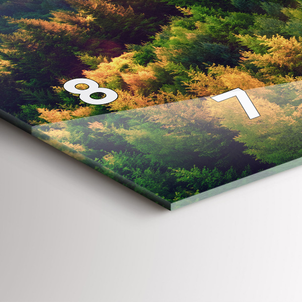 Vízszintes üvegóra Naplemente a dombok felett