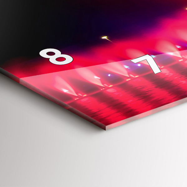 Vízszintes üvegóra Wroclaw-kút éjjel